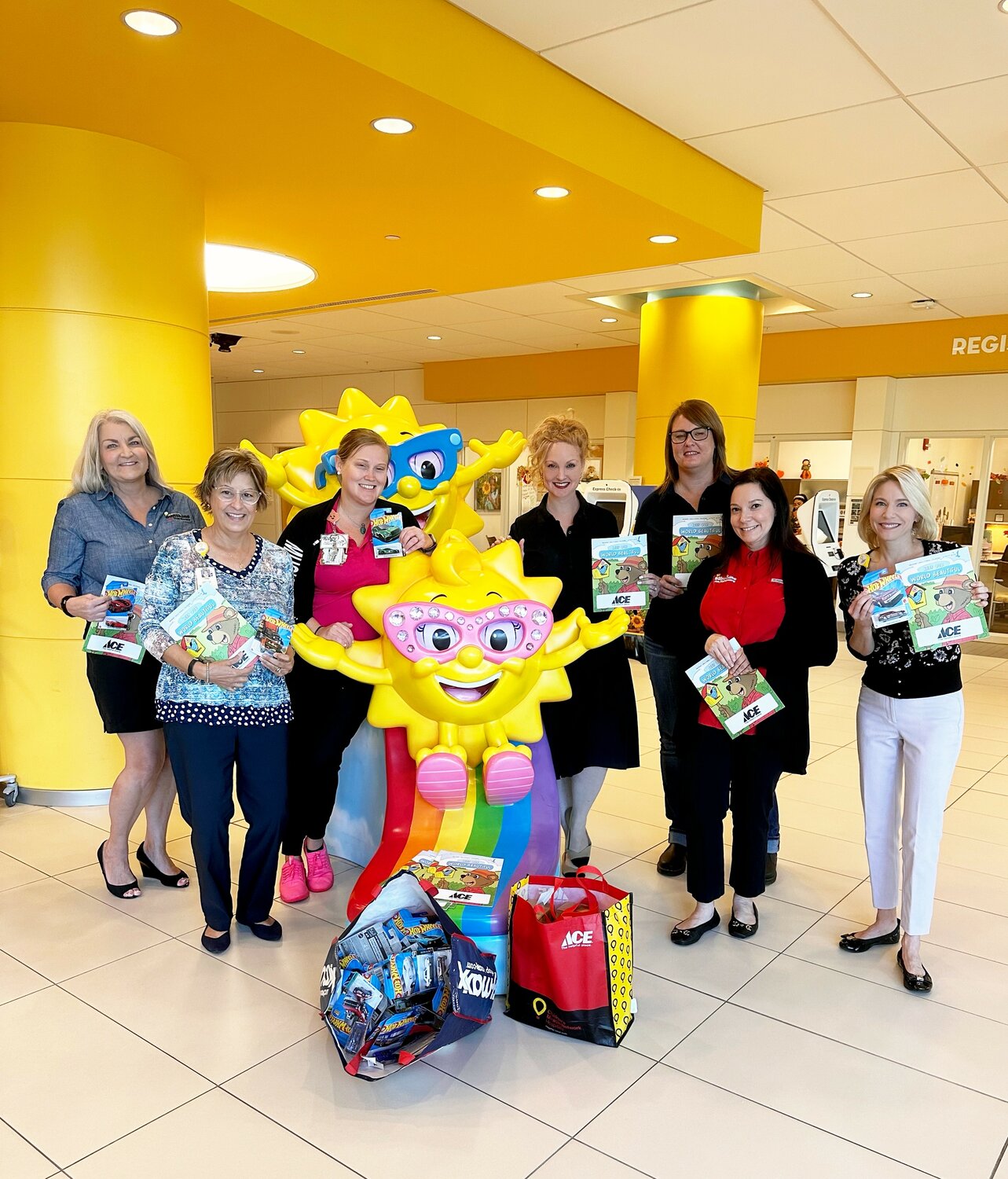 Representatives from Sunshine Ace Hardware donated toys, coloring books and other items while touring Golisano Children’s Hospital on Nov. 6.